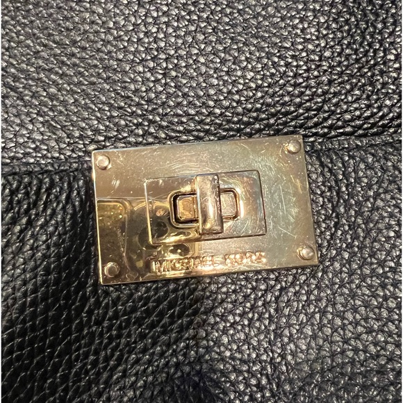 Black bag with gold hardware. - Picture 4 of 6